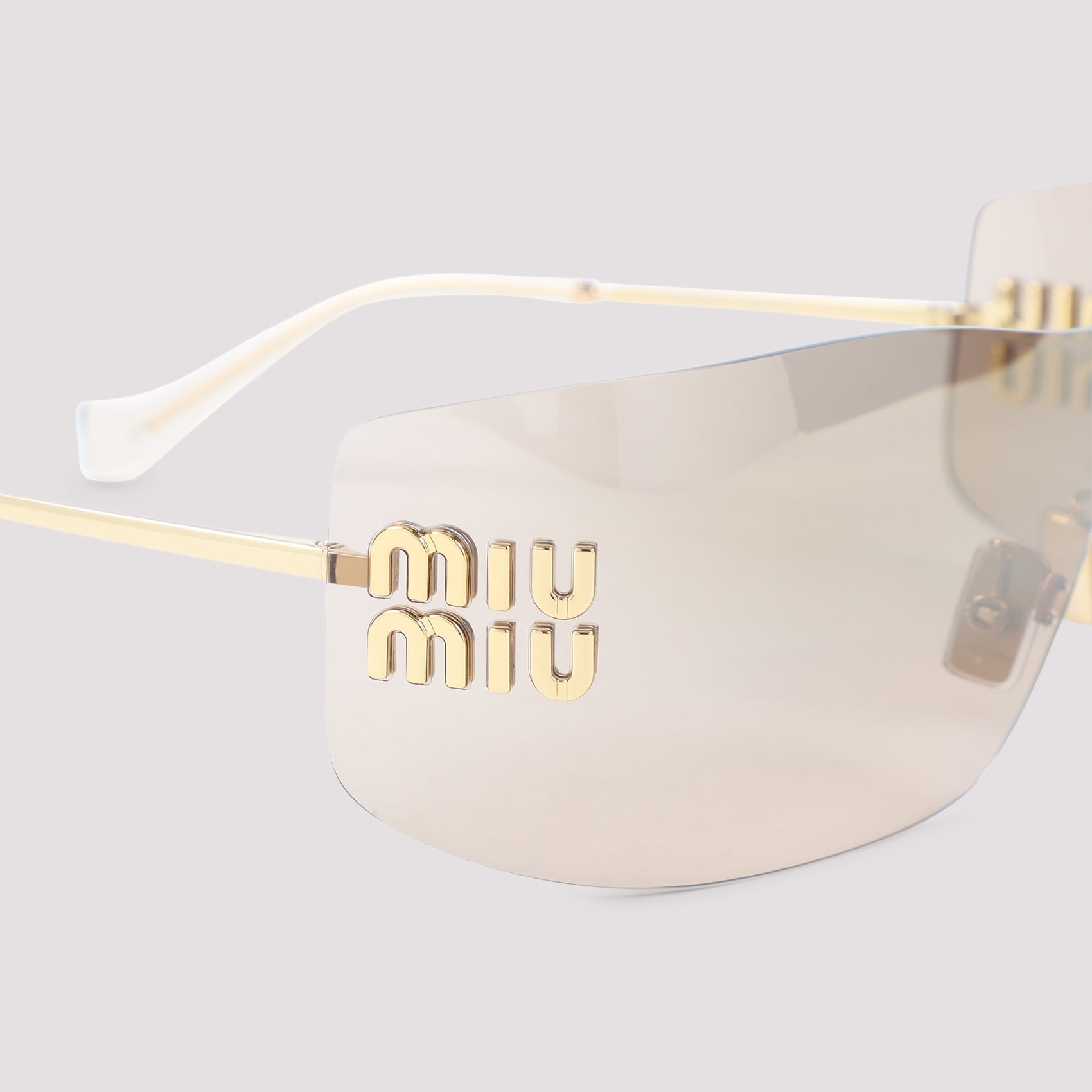 Miu Miu Eyewear Sunglasses - Brown | 12f4e3a234265d15e554c2badef24609ecc4e1c9