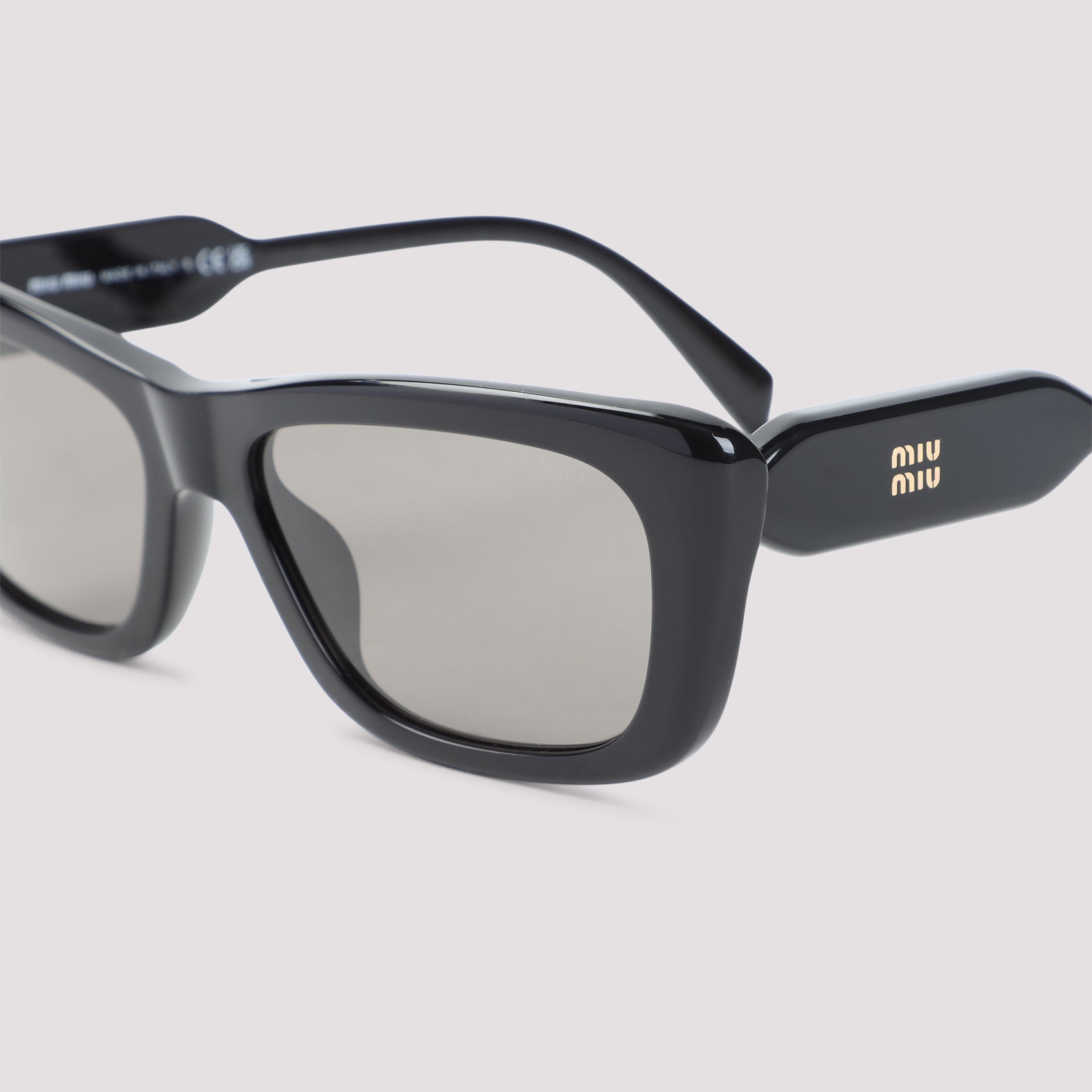 Miu Miu Eyewear Sunglasses - Black | caaa32abd9cc28df51879e60236f3ff85e6b62e1