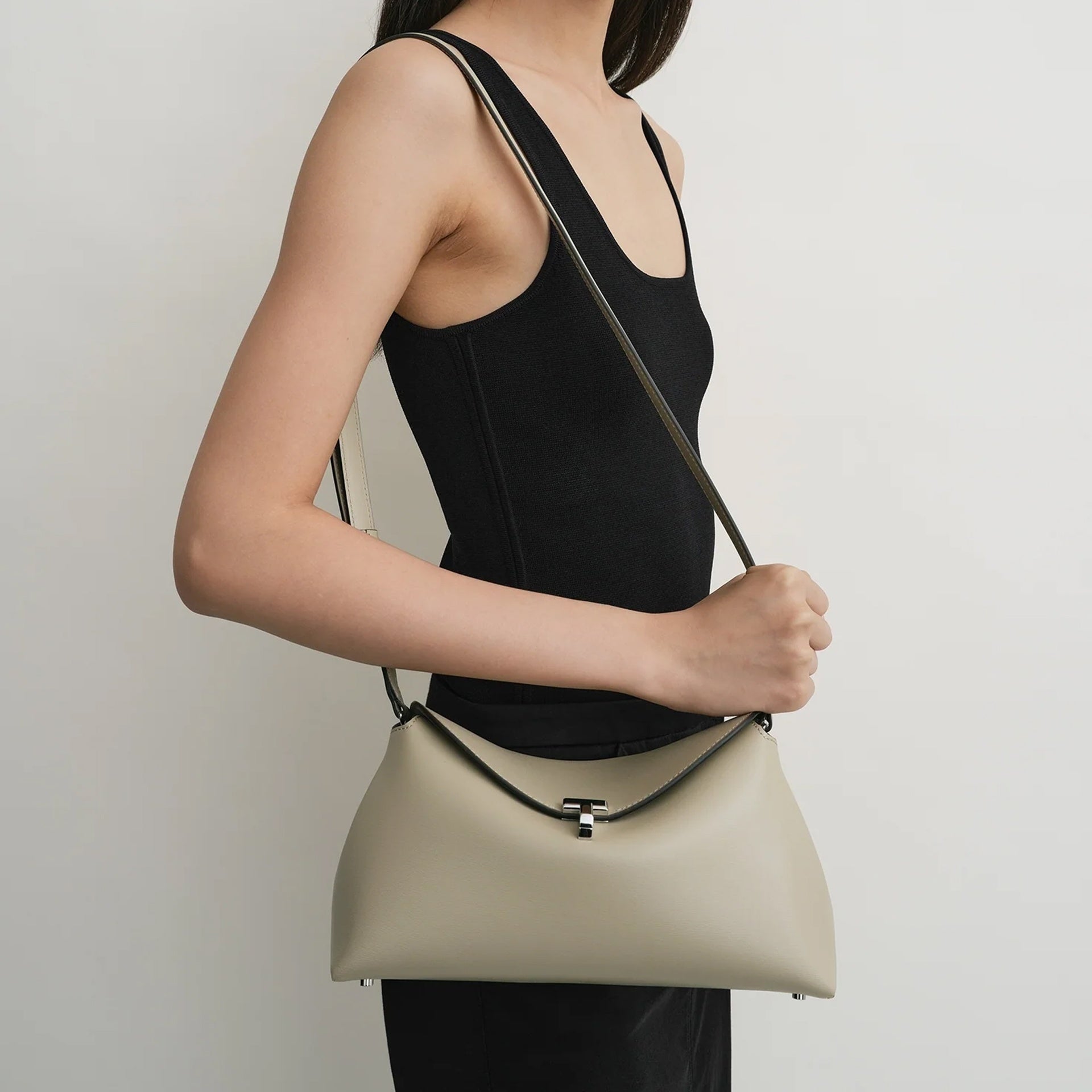 Toteme T-Lock Leather Clutch Bag